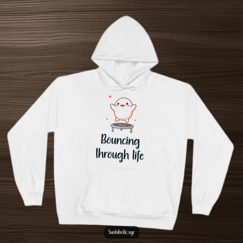 Funny Mochi Hoodie depicting a happy mochi character performing an energetic bounce on a tiny trampoline, perfect for cozy humor.